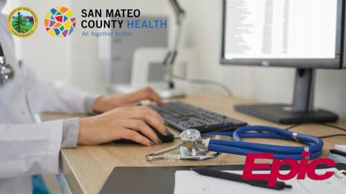 A healthcare professional's hand is on a keyboard, with a stethoscope and documents on the desk. Logos for San Mateo County Health and Epic are visible.